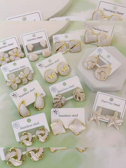 32 pares de elegantes pendientes de acero inoxidable con formas geométricas como flor, gota, mariposa y alas. Estos sencillos y elegantes pendientes de acero inoxidable son adecuados para que las damas los usen en su vida diaria y también son el mejor regalo para amigas.