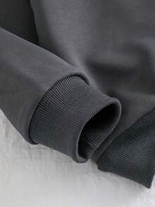 女童卡通印花纯色卫衣长裤两件套，简约设计，适合春、秋、冬季穿着。