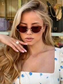 一副复古半框半圆金属时尚眼镜，用途广泛，适合日常佩戴、街头摄影、度假、海滩等场合，猫眼镜腿设计尽显时尚品味。 - 8058-茶色 - 查看 1