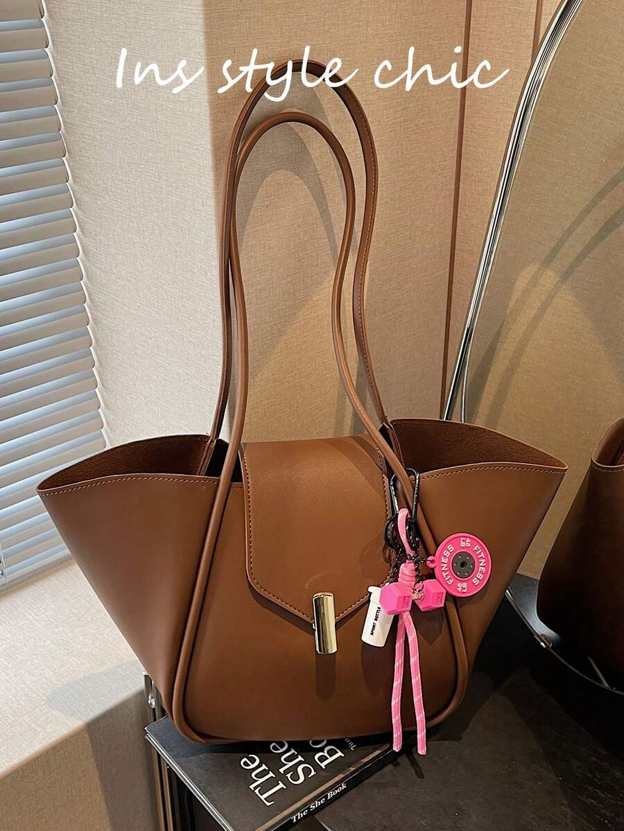 新款时尚经典纯色PU防水材质，磁扣设计，粉色哑铃吊坠，大容量单肩手提包，带翅膀的包，商务通勤包，适合女性旅行、购物、通勤、外出和约会。 - 查看 1