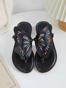 1双女童夏季时尚拖鞋，彩色蝴蝶翅膀设计，拼接工艺，百搭黑色，沙滩人字拖，适合日常穿着、沙滩派对