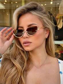 一副复古半框半圆金属时尚眼镜，用途广泛，适合日常佩戴、街头摄影、度假、海滩等场合，猫眼镜腿设计尽显时尚品味。 - 8058-茶色 - 查看 2