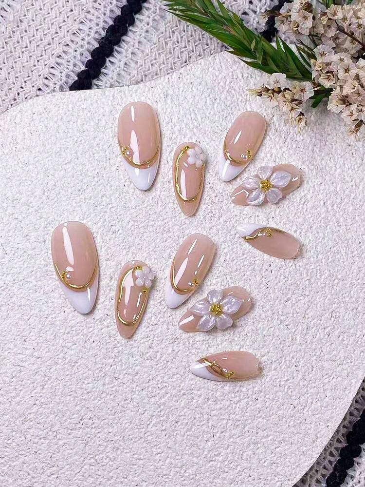 10pcs Handmade Almond-Shaped False Nails, Featuring Asymmetrical White French Tip Design With Gold Trim And Cherry Blossom Carving. Highlights Include: Handpainted Asymmetrical White French Tips Outlined With 3D Metallic Gold Lines, Adorned With Handcrafted Pearlescent 3D Carvings, White Cherry Blossoms, Metal Beads And Pearls. - Multicolor - View 6
