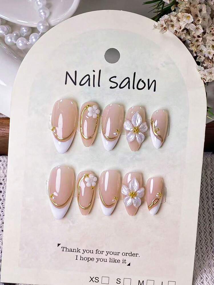 10pcs Handmade Almond-Shaped False Nails, Featuring Asymmetrical White French Tip Design With Gold Trim And Cherry Blossom Carving. Highlights Include: Handpainted Asymmetrical White French Tips Outlined With 3D Metallic Gold Lines, Adorned With Handcrafted Pearlescent 3D Carvings, White Cherry Blossoms, Metal Beads And Pearls. - Multicolor - View 1