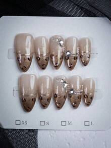 10 件性感豹纹杏仁形按压指甲，手工制作的野生豹纹假指甲，带有星星和水钻，性感而优雅，适合日常、旅行、派对，是送给女士和女孩的完美礼物