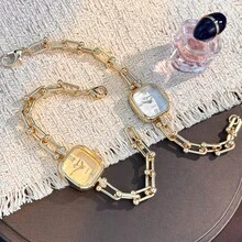 1 chiếc đồng hồ nữ vỏ hợp kim bất đối xứng, dây đeo hình chữ U mới, máy quartz, thời trang cá tính, phù hợp để phối đồ dự tiệc. - Vàng - Xem 6