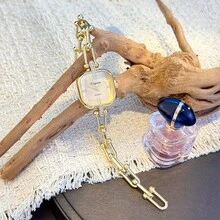 1 chiếc đồng hồ nữ vỏ hợp kim bất đối xứng, dây đeo hình chữ U mới, máy quartz, thời trang cá tính, phù hợp để phối đồ dự tiệc. - Vàng - Xem 5