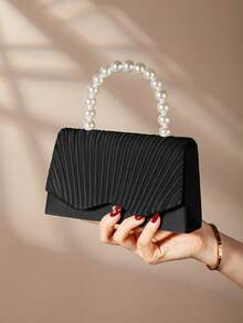 REMANLAND 一款优雅迷人的珍珠手拿包，精致奢华，翻盖设计，适合作为鸡尾酒会/派对包、女士晚宴包、单肩/斜挎包，配有金属链条肩带，是女士出席派对、婚礼、盛会、宴会的理想之选，也是派对女孩和女士的完美之选，同时也是送给女性的绝佳礼物。 - 黑色 - 查看 4