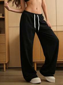 宽松抽绳设计休闲阔腿裤，适合夏季和秋季户外运动和日常穿着，是送给女朋友的返校季好礼物