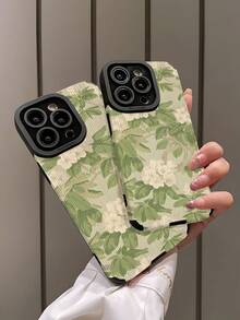 1 chiếc ốp lưng điện thoại phong cách tối giản cổ điển in hình lá xanh và hoa trắng, chất liệu giả da mềm mại, chống trượt, thích hợp làm quà tặng cho bạn bè và người yêu, tương thích với iPhone 17/17 Air/17 Pro/17 Pro Max và các dòng điện thoại khác. - Nhiều màu - Xem 4