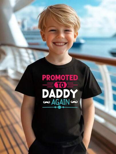 Camiseta gráfica "Promovido a papá de nuevo" para niños, camiseta negra con texto colorido en rosa, blanco y verde azulado, perfecta para celebraciones y salidas familiares, regalo divertido y elegante