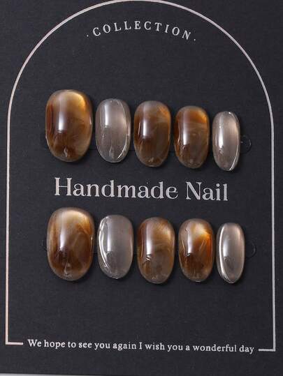10pcs/Set European And American Handmade Short Oval Nail Pieces In Y2K Brown Style & Handcrafted Gradient Shading Cat Eye Design Nail Decoration. 1 Piece Of Jelly Gel And 1 Piece Of Nail File. Perfect For Daily Life As Well As For Costumes For Coachella Music Festival Parties, Press On Nails And Nail Care Products.