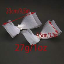 1. 蝴蝶结发夹，优雅百搭的白色新娘发饰，适合婚礼登记、婚纱照拍摄和仪式佩戴。2. 扎染蝴蝶发夹，清新花卉造型，时尚别致的女士发饰。3. 手工度假风发夹，适合户外、海滩、旅行和婚礼等场合佩戴。 - 彩色 - 查看 3