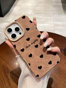 1个时尚简约柔软心形文字印花棕色手机壳，时尚高端防滑磨砂质感，适用于17/16/15/14/13/12/11/Promax/Pro/Plus系列及其他型号，是送给同事、朋友、家人、情侣的理想礼物，也适合生日、新年、情人节、斋月、复活节等场合。