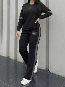 两件套女士休闲宽松条纹印花圆领长袖T恤搭配松紧腰阔腿裤，舒适日常通勤装，春秋季