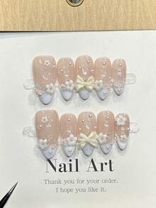 10 unhas postiças artesanais em formato amêndoa, acrílicas, tamanho médio, rosa suave, com francesinha branca, com pingentes de pérolas pequenas, laço de flor simples em 3D, estilo outonal elegante e moderno, perfeitas para o Dia dos Namorados, festas, encontros, praia e viagens tropicais. Ideais para criar unhas postiças DIY, perfeitas para mulheres e meninas como presente. - Rosa - Ver 8