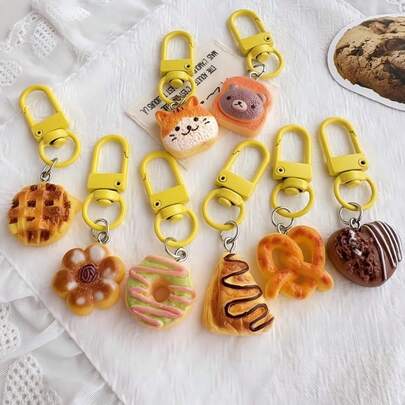 This Adorable Bread-Shaped Pendant Makes A Wonderful New Year's Small Gift. It Can Be Used To Decorate Backpacks, Handbags And Rucksacks, Or As A Practical Keychain. With Its Cute Appearance, It Is Great For Wholesale And An Excellent Gift Choice For Friends, Colleagues And Family During The Holiday Season.