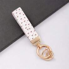 1个樱桃图案真皮钥匙扣，不仅是钥匙扣，更是精致的手机挂饰！采用优质皮革制成，触感柔软舒适，质感细腻。生动的樱桃图案，无论挂在钥匙上还是手机上，都能成为吸睛的点缀，彰显独特品味和个性。 - 1pc小櫻桃圖案皮革鑰匙圈 - 查看 4