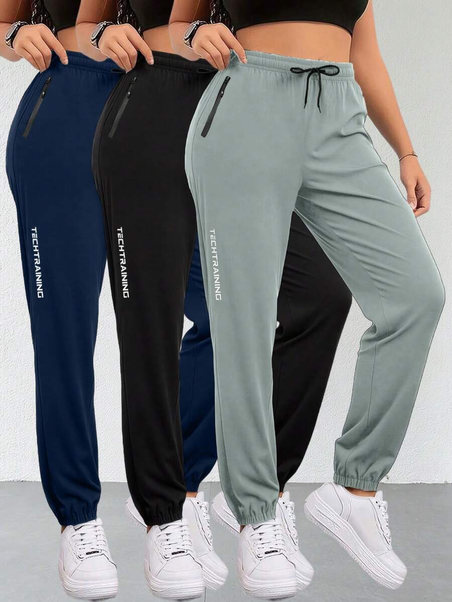 女士运动慢跑裤，抽绳腰带，弹性腰围，拉链口袋，适合春秋季跑步和健身。