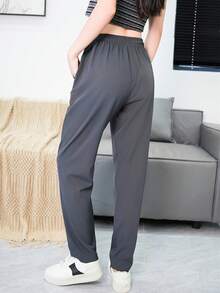 1 chiếc quần thể thao nữ dáng suông, nhẹ, kiểu dáng thường ngày, có túi khóa kéo, cạp chun co giãn, phù hợp cho tập luyện và mặc hàng ngày, mùa xuân/thu. - Xám - Xem 6