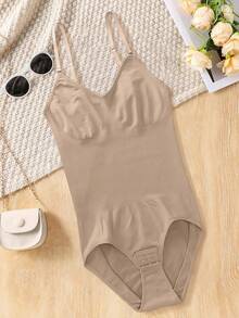 Bộ đồ liền thân không đường may màu trơn dành cho nữ, có dây đeo điều chỉnh được, giúp định hình vòng bụng, nâng hông, thon gọn eo và tạo dáng chân, khóa cài ở đáy quần, thích hợp mặc hàng ngày như lớp lót bên trong. - Màu be - Xem 3