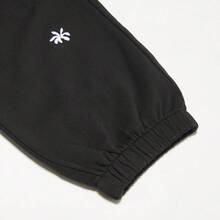 Puma 女士时尚刺绣抽绳踝口针织裤，休闲运动裤 - 黑色 - 查看 4