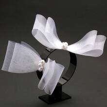 1. 蝴蝶结发夹，优雅百搭的白色新娘发饰，适合婚礼登记、婚纱照拍摄和仪式佩戴。2. 扎染蝴蝶发夹，清新花卉造型，时尚别致的女士发饰。3. 手工度假风发夹，适合户外、海滩、旅行和婚礼等场合佩戴。 - 彩色 - 查看 8