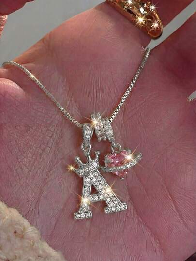 1 pieza Collar de cadena de clavícula de acero inoxidable plateado con colgante de letra de corona personalizada con gema de corazón de circonita cúbica rosa, minimalista y lujoso, para uso diario de mujeres y niñas, como regalo de San Valentín / Cumpleaños