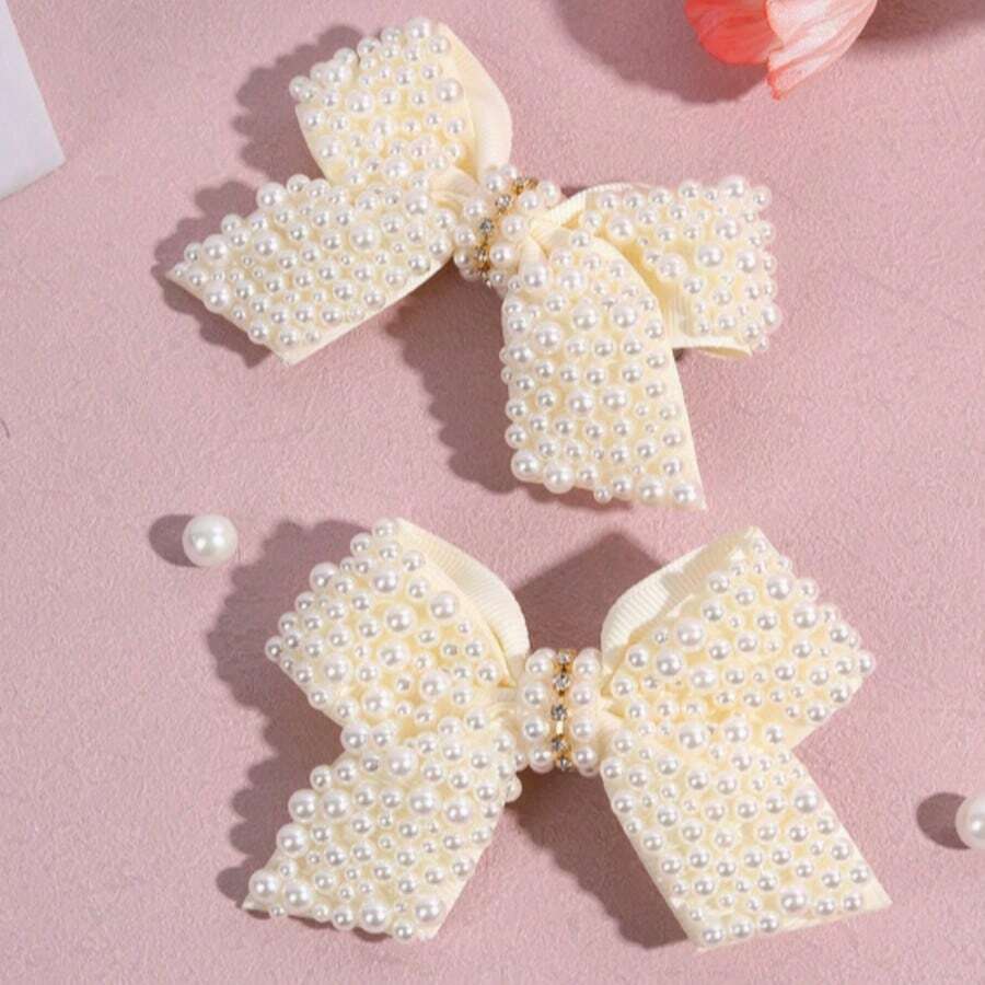 2个奶油色珍珠蝴蝶结发夹 - 鳄鱼夹，适合女孩、青少年和婴儿，日常和派对发饰 - 米色 - 查看 1