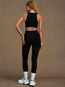 VVX Bộ đồ tập thể dục nữ 2 mảnh phối màu, áo ngực thể thao cổ yếm có đệm mút tháo rời, quần legging cạp cao ôm bụng, không đường may, phối viền tương phản, thích hợp cho phòng tập, hoạt động thể thao, mặc hàng ngày, mọi mùa. - màu đen - Xem 7