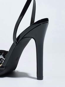 Jin Bei Qi 这款女士高跟鞋采用闪亮的3D透气网布和柔软的镜面材质，尖头设计性感细高跟，适合春夏夜店、高端派对和户外时装秀等场合。可调节踝带，黑色女士凉鞋，时尚百搭，可与连衣裙完美搭配，尽显优雅气质。 - 黑色 - 查看 6