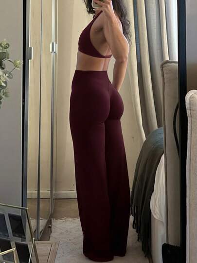 Pantalones acampanados ajustados de unicolor elegantes y modernos para el trabajo y el deporte de las mujeres