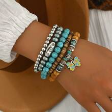 波西米亚风手链套装，绿松石、木珠、合金牛头和树叶吊坠，男女皆宜的多层手链