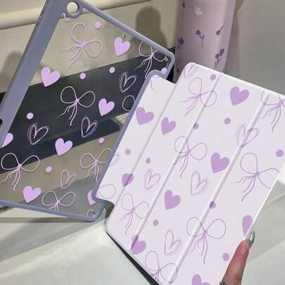 Ốp lưng hai mặt bằng acrylic trong suốt hình trái tim và nơ tím hoạt hình dễ thương, chống sốc, phù hợp với iPad thế hệ thứ 7, 8, 10 (10.2 inch), có khe cắm bút cảm ứng, hỗ trợ chức năng bật/tắt màn hình, là món quà Giáng sinh và năm mới lý tưởng.