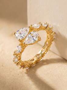 1枚闪耀夺目的水滴形开口戒指，镶嵌立方氧化锆，适合女士参加派对和正式场合佩戴，铜质材质，不褪色且低致敏性，是理想的节日礼物。 - 金色 - 查看 4