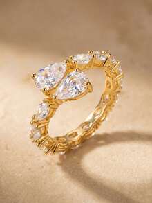 1枚闪耀夺目的水滴形开口戒指，镶嵌立方氧化锆，适合女士参加派对和正式场合佩戴，铜质材质，不褪色且低致敏性，是理想的节日礼物。 - 金色 - 查看 7