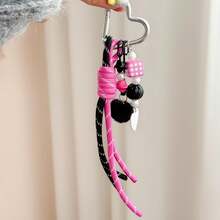 Questo portachiavi a forma di cuore è realizzato in corda intrecciata resistente con un design personalizzato. È un accessorio multifunzionale che può essere appeso a borse e bagagli per aggiungere un tocco di moda e può anche essere un ottimo piccolo regalo per uso quotidiano. - Multicolore - Visualizzare 9