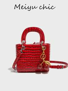 这款简约时尚的方形手提包采用PU材质，配有双提手。它是一款用途广泛且实用的包袋，适合女性、大学生、通勤族、约会、外出和日常通勤使用。 - 紅色 - 查看 1