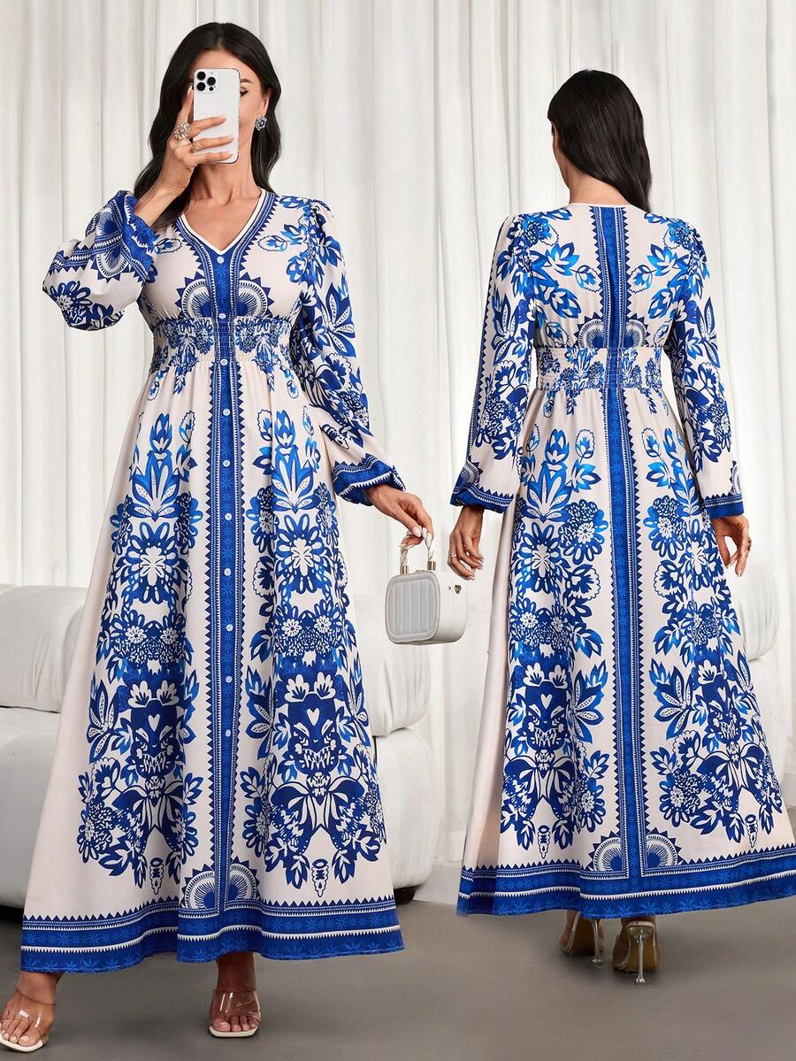 这款全新优雅女士连衣裙采用蓝白条纹印花设计，V领和泡泡长袖，并饰以精致的中东风情细节，尽显优雅气质。连衣裙饰有精美的提花印花，是日常穿着、派对和正式场合的理想之选。