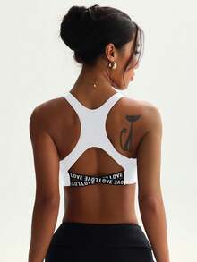 Women's Solid Color Removable Padded Hollow Back Letter Strap Elastic Sports Bra, Summer White Spring - White - View 6