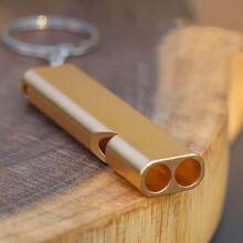 Crafted From Durable Metal, This Compact Golden Survival Whistle Features A Polished Finish That Provides A Reliable, High-Pitched Sound For Emergencies, Designed With A Convenient Keychain Attachment For Easy Portability And Immediate Access. - Gold - View 4