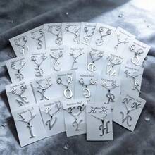 7件套不锈钢英文字母女士首饰套装，优雅简约混搭风格耳环项链套装，适合派对、婚礼、日常佩戴，时尚首饰，最佳礼物 - 隨機7組耳環項鍊套裝 - 查看 7