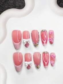 Bộ 10 móng tay acrylic kiểu Pháp ngọt ngào, móng giả acrylic, nơ trắng 3D dễ thương, trang trí móng hoa hồng gradient thủ công, thiết kế đá pha lê lấp lánh bất đối xứng, viền vàng hồng huyền ảo, phụ kiện làm móng phong cách sống động và đáng yêu, móng giả thủ công. - Nhiều màu - Xem 12