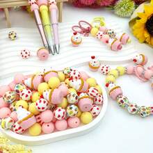 25/28颗粉色冰淇淋、蝴蝶结、爱心硅胶珠套装，搭配彩色爱心和甜甜圈图案圆珠，适合制作首饰、耳环、项链、包包、笔、手机链、化妆刷等DIY饰品，是返校季、节日、生日礼物的理想之选。