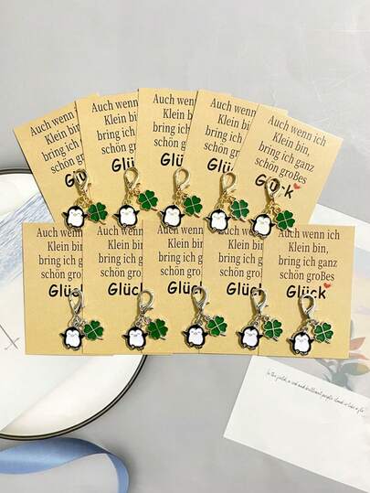10 pièces Porte-clés pingouin mignon avec cartes de vœux allemandes inspirantes, porte-clés animaux, porte-clés trèfle à quatre feuilles porte-bonheur, cadeaux de soutien, porte-clés en alliage, cadeaux de chance pour les amis, la famille, les enseignants, convenant aux hommes et aux femmes, fête, bonne chance, cadeaux créatifs - pour sacs, clés, décorations de fête, décorations de vacances, cadeaux de mariage, cadeaux pour femmes, cadeaux de la Saint-Patrick