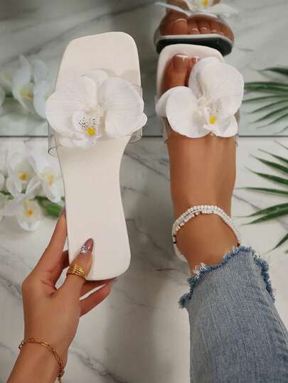 仙女风平底PVC花朵凉拖鞋，夏季新款温柔时尚小众沙滩拖鞋，时尚百搭舒适