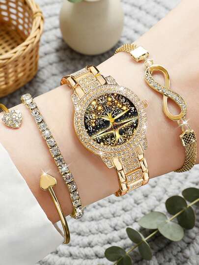 四件套优雅奢华女士石英表套装，女士金色配饰套装（包含：镶满水钻的金属表带树与星空图案石英表、镶满水钻的手链、心形装饰手镯、无限符号水钻手链）。表盘采用镶满水钻的金色金属底座，并融入了树与星空的图案细节。