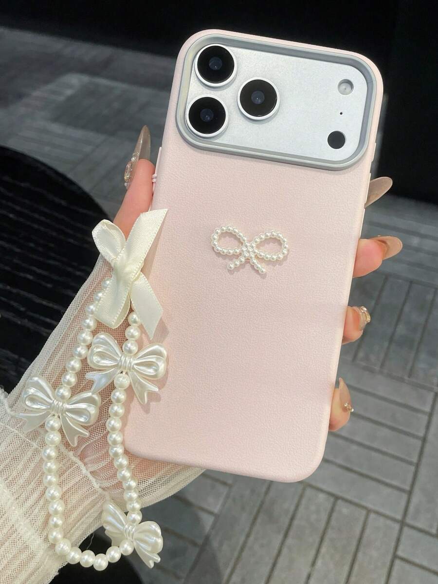 1个皮革质感纯粉色手机壳，可爱少女风，配有仿珍珠蝴蝶结和可拆卸挂绳，防震防滑防刮，兼容 17、17 Pro、17 Pro Max、17 Air、16、15、14、13、12、11、Pro、Pro Max、Plus、S20-S25/FE/Ultra、A56 5G等机型。 - 粉色 - 查看 1