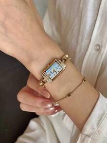 This Brand-New Gold French Retro-Style Brooch Women's Watch Exudes Understated Luxury. Adorned With Rhinestones, Its Stylish Simplicity Showcases Understated Elegance. Exquisitely Small And Waterproof, This Classic Quartz Timepiece Features A Delicate Mother-Of-Pearl Dial With Arabic Numeral Markers. Suitable For Everyday Wear, Evening Events, And Various Other Occasions, It Also Makes A Fitting Wrist Accessory, Or A Holiday Or Birthday Gift. - Gold - View 4