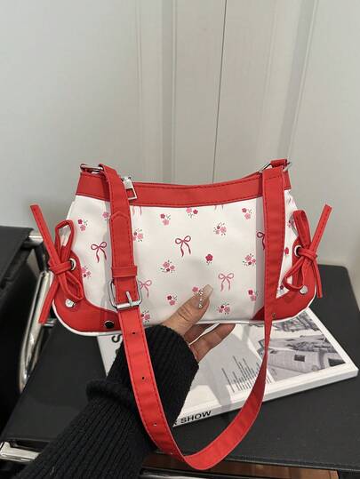 Este bolso de mujer de nueva marca presenta un diseño de bolso de hombro cuadrado inspirado en el estilo vintage, decorado con un estampado de lazo y un cierre con cremallera. Este compacto y ligero bolso de axila es perfecto para mujeres que van al trabajo, estudiantes y trabajadores de oficina para uso diario, y también sirve como un accesorio de moda para ocasiones casuales.